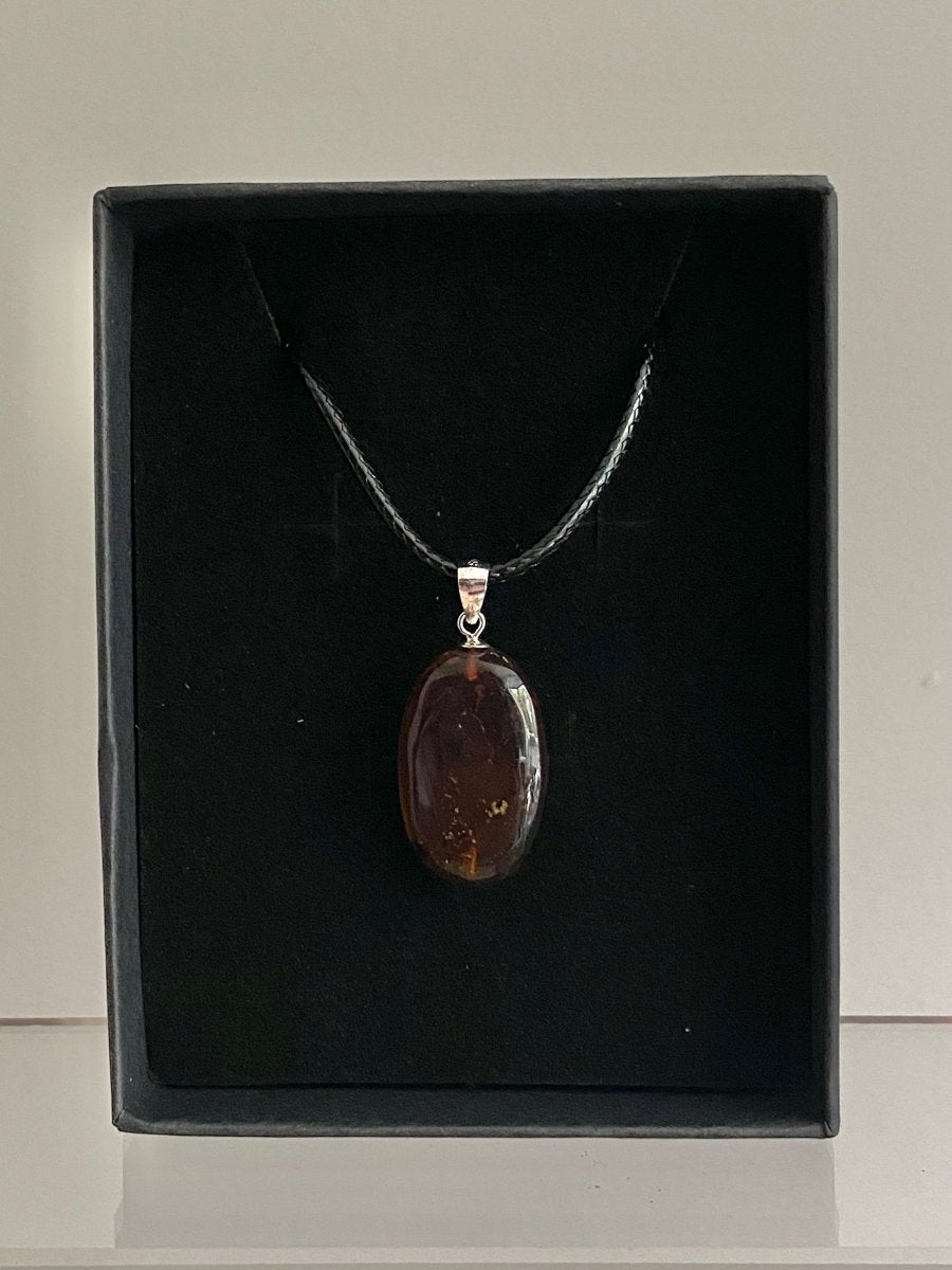 Burmite amber pendant with small fly (0.89") - FossilsAndMore